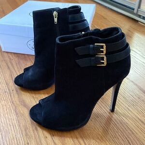 Black Steve Madden open-toe stiletto booties with gold hardware - Amberr
